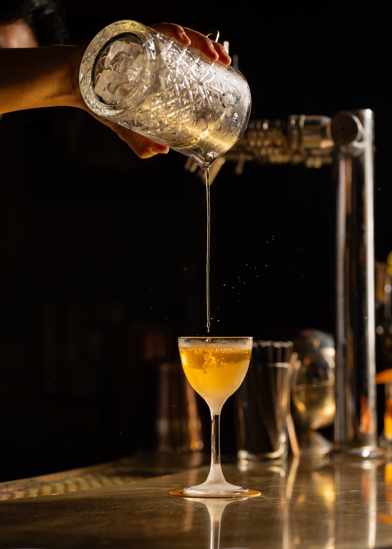 Cocktail being poured at Employees Only Sydney